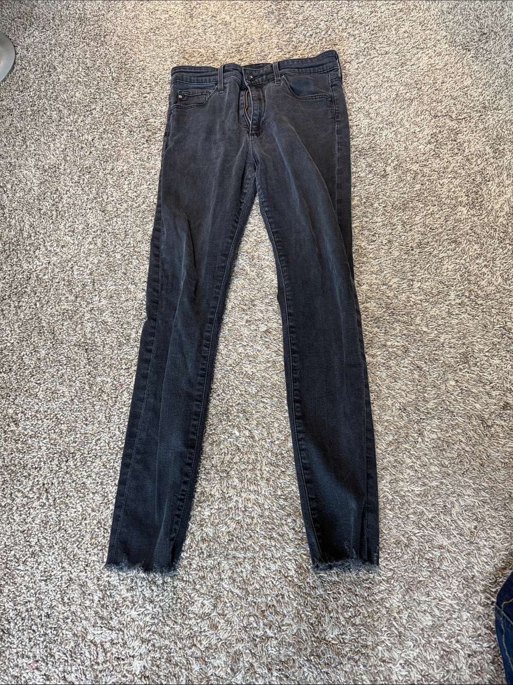 High-Rise Black Skinny Jeans with Frayed Hem